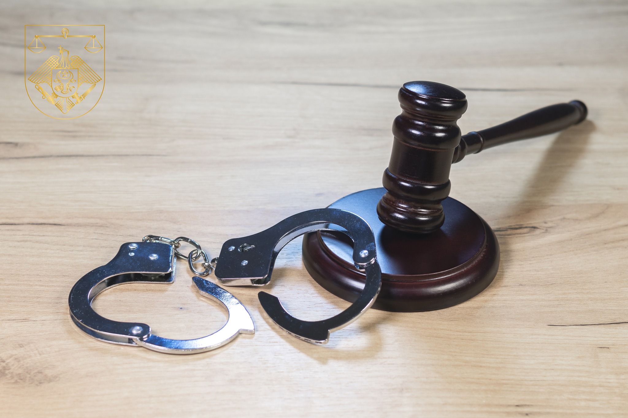 Judge Hammer for adjudication with wooden stand and handcuff. Auction or Lawyer decision. Law and justice concept. Court of law. Pronouncing sentence, striking Gavel.
