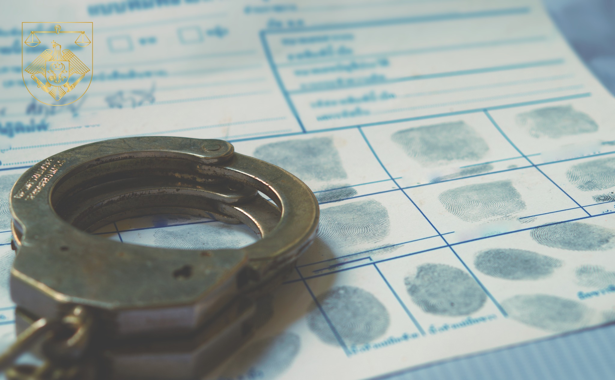 Police handcuff on fingerprint crime page file.Crime and violence concept.