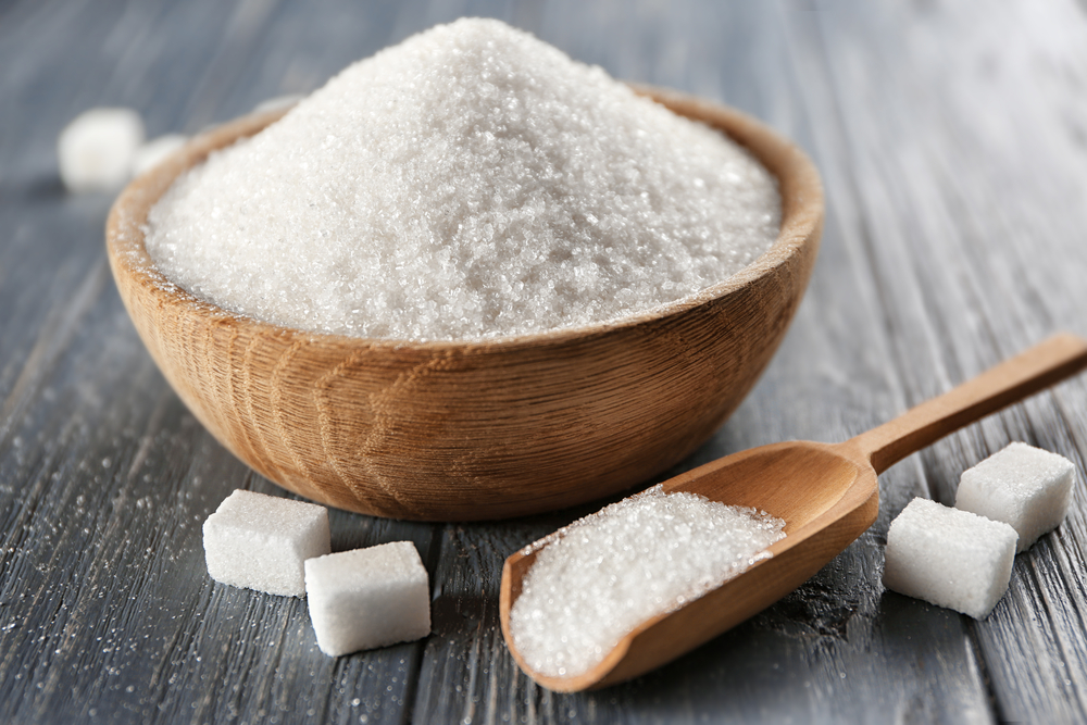 Bowl,And,Scoop,With,White,Sand,And,Lump,Sugar,On