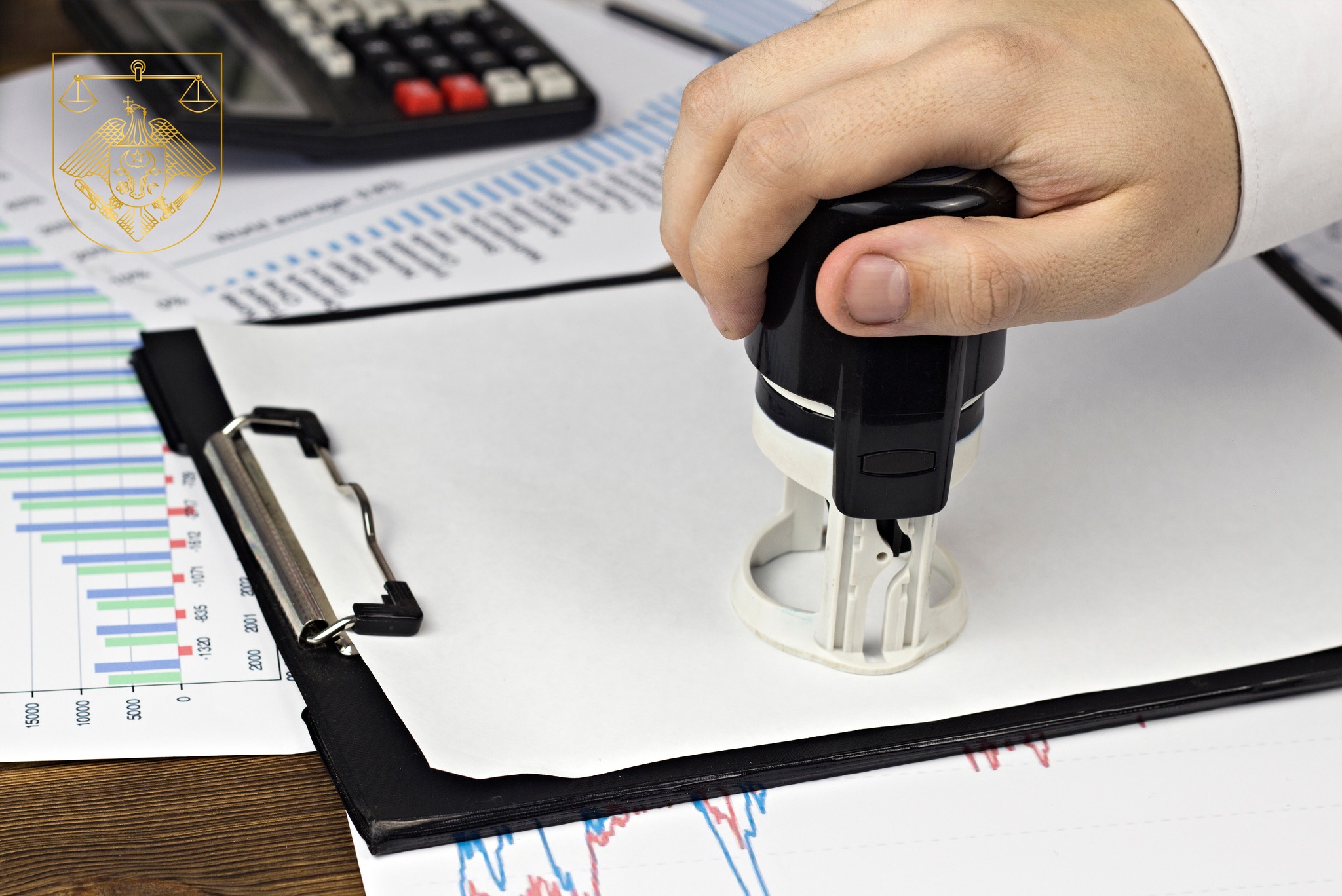 A man puts a seal on a blank sheet