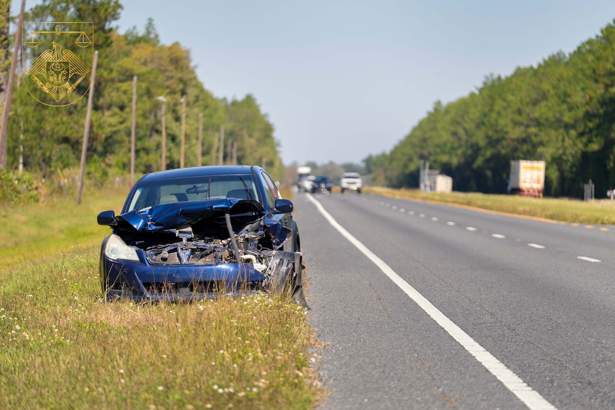 Dented car damaged after traffic accident parked on highway roadside. Transportation hazard concept