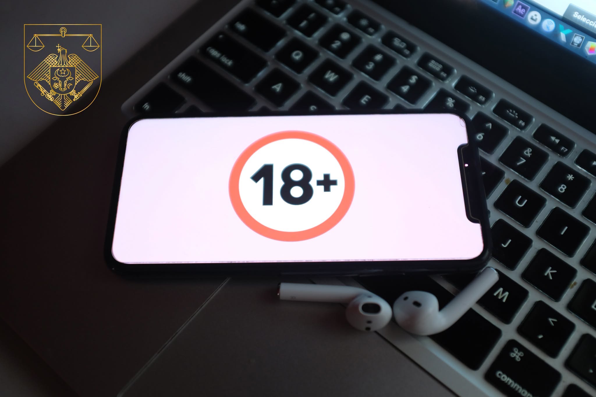 iphone 11 pro with the icon OVER 18 YEARS OLD, coming of age is a condition to determine the person's full capacity to act. United States New York Wednesday, October 16, 2019